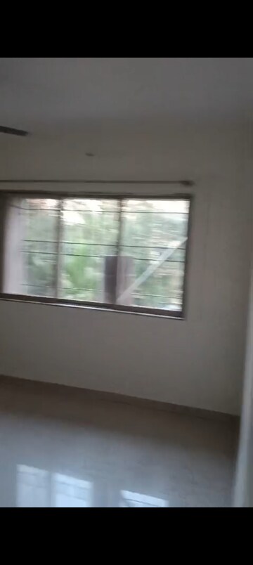 Room in 2 BHK Apartment at Bhoomi Classic, Malad West – for Rent