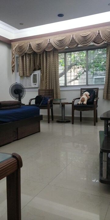 Living Room in 3 BHK Apartment at Santacruz West – for Sale