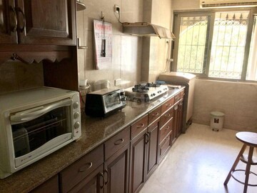 Kitchen in 2 BHK Apartment at Ahuja Chardham Apartment, Bandra West – for Sale