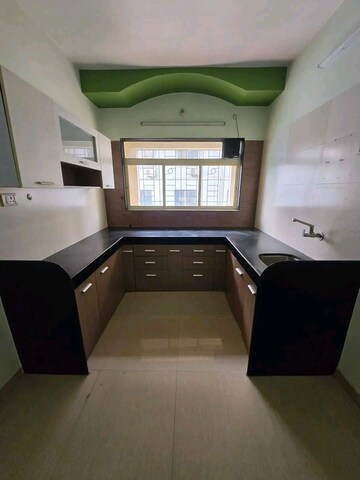 Kitchen in 2 BHK Apartment at Om Shree Riddhi Siddhi CHS, Nalasopara West – for Sale