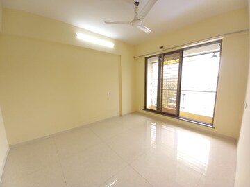 Room in 3 BHK Apartment at Riddhi Garden, Malad East – for Sale