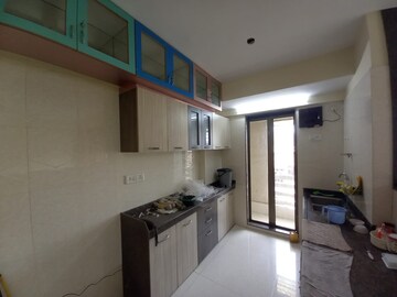 Kitchen in 3 BHK Apartment at Riddhi Garden, Malad East – for Sale