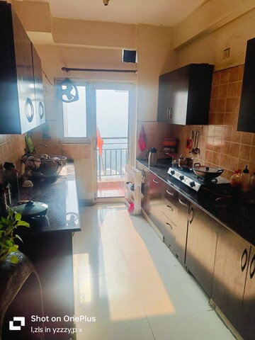 Kitchen in 3 BHK Apartment at Amrapali Silicon City, Sector 76 – for Rent