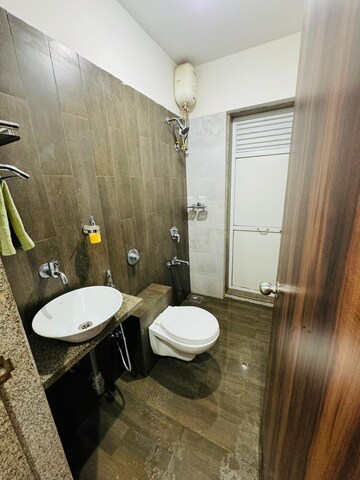 Bathroom in 1 BHK Apartment at Puranik City Sankul, Owale – for Rent