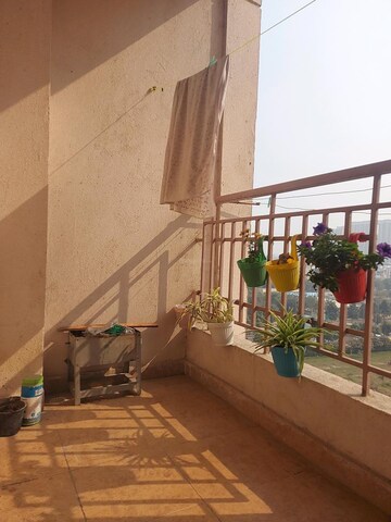 Balcony in 3.5 BHK Apartment at Aims Golf City, Sector 75 – for Rent