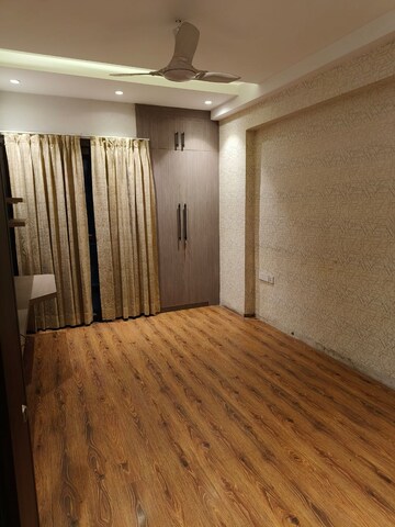 Bedroom in 3 BHK Builder Floor at Ansal Sushant Lok I, Sector 43 – for Rent