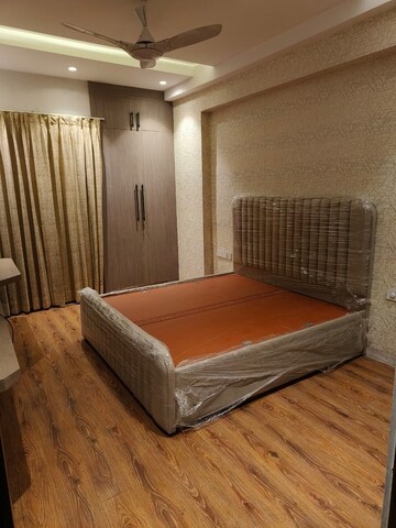 Bedroom in 3 BHK Builder Floor at Ansal Sushant Lok I, Sector 43 – for Rent