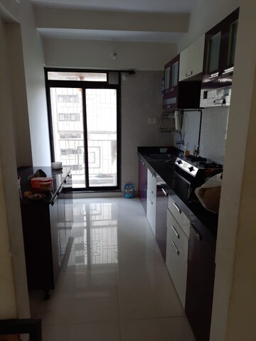 Kitchen in 2 BHK Apartment at Raunak Park View, Ghodbunder Road – for Sale