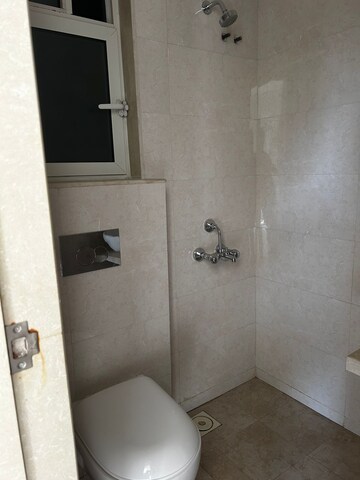 Bathroom in 1 BHK Apartment at JP Eminence, Andheri West – for Rent