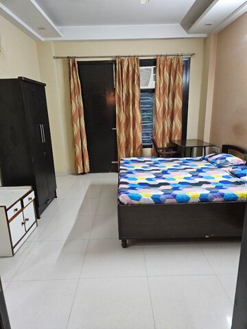 Bedroom in 4 BHK Builder Floor at Ansal Sushant Lok I, Sector 43 – for Rent