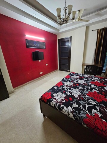 Bedroom in 4 BHK Builder Floor at Ansal Sushant Lok I, Sector 43 – for Rent