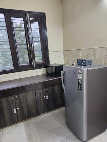 Kitchen in 4 BHK Builder Floor at Ansal Sushant Lok I, Sector 43 – for Rent