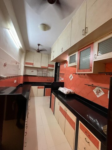 Kitchen in 4 BHK Apartment at Cumbala Hill – for Rent
