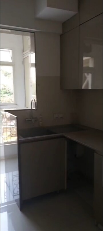 Kitchen in 3 BHK Apartment at Hiranandani Meadows, Manpada – for Rent