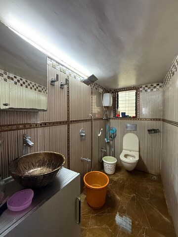 Bathroom in 2 BHK Apartment at Harsh Kaushal Tower, Dahisar East – for Sale