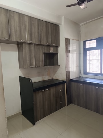 Kitchen in 2 BHK Apartment at Unnati Woods CHS, Kasarvadavali – for Sale