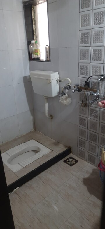 Bathroom in 1 BHK Apartment at Vrindavan Garden Co Hs Society, Kalyan West – for Sale