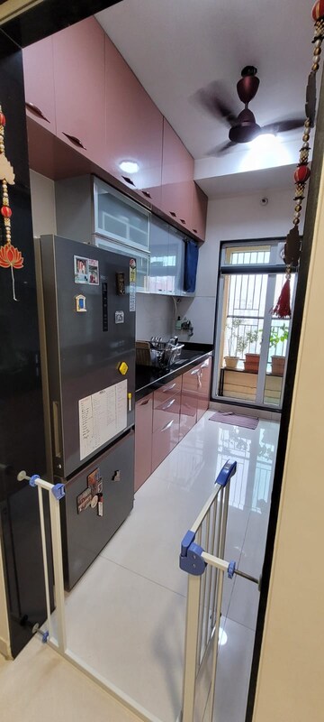 Kitchen in 2 BHK Apartment at Rustomjee Urbania Azziano, Majiwada – for Sale