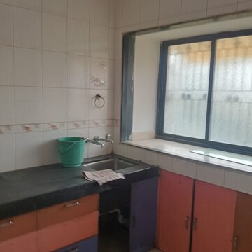 Kitchen in 1 BHK Apartment at Vrindavan Garden Co Hs Society, Kalyan West – for Sale