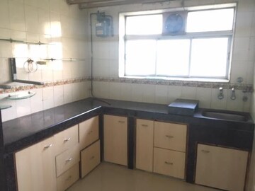 Kitchen in 1 BHK Apartment at Satya Darshan CHS, Andheri East – for Rent