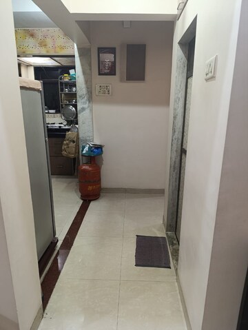 Living Room in 1 BHK Apartment at Kingston Heights, Malad West – for Sale
