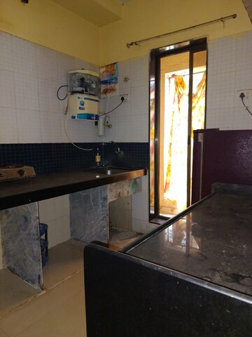 Kitchen in 1 BHK Apartment at Om Sai Heights Phase II, Nalasopara West – for Sale