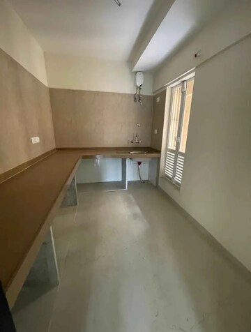Kitchen in 2 BHK Apartment at Dosti West County, Balkum Pada – for Rent
