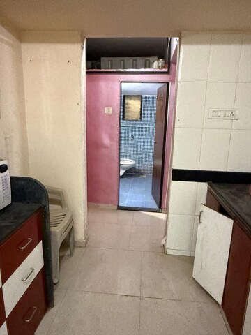 Kitchen in 1 BHK Apartment at Space Ashley Garden, Mira Road – for Sale
