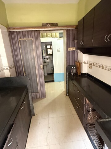 Kitchen in 2 BHK Apartment at New Shree Avenue Complex, Hatkesh Udhog Nagar – for Rent