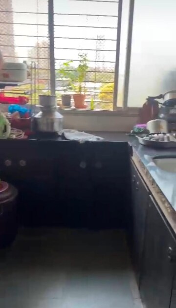 Kitchen in 1 RK Apartment at Vasundhara CHS Gokuldham, Gokuldham Colony – for Sale