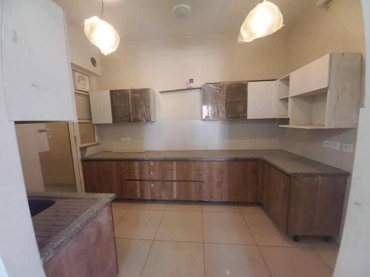 Kitchen, aba-cleo-county 3 Bedroom 1620 Sq.Ft. Apartment In Sector 121 Noida 8081148