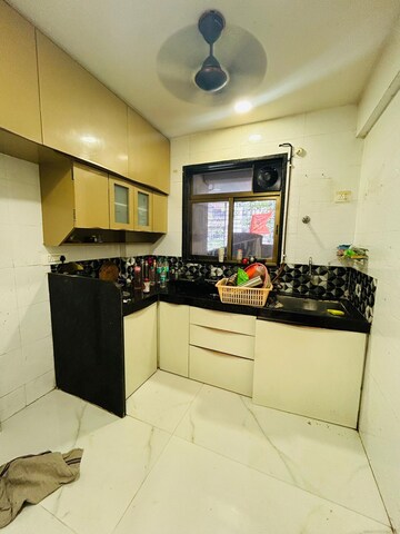 Kitchen in 2 BHK Apartment at Seawoods – for Sale