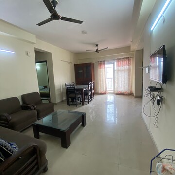 Living Room in 3 BHK Apartment at Aims Golf City, Noida Central – for Rent