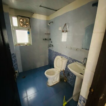 Bathroom in 2.5 BHK Apartment at Aims Golf City, Noida Central – for Rent