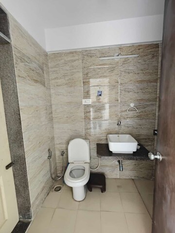 Bathroom in 3 BHK Apartment at Akshar Alvario, Seawoods – for Rent
