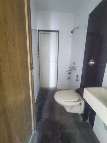 Bathroom in 1 BHK Apartment at Vihang Valley Phase 2, Kasarvadavali – for Rent