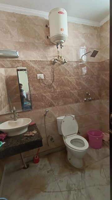 Bathroom in 3 BHK Builder Floor at Ansal Plaza Sector-23, Sector 23 – for Rent