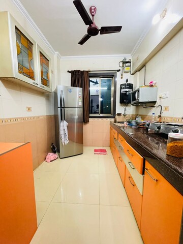 Kitchen in 3 BHK Apartment at T Bhimjyani Neelkanth Woods, Manpada – for Sale