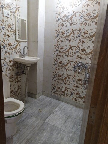 Bathroom in 3 BHK Apartment at Govindpuri – for Rent