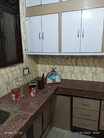 Kitchen in 1.5 BHK Builder Floor at Shalimar Garden – for Sale