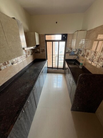 Kitchen in 2 BHK Apartment at Paradise Sai World Empire, Kharghar – for Rent
