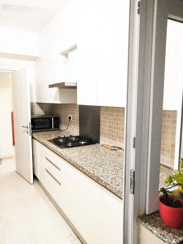 Kitchen in 3 BHK Apartment at DLF The Skycourt, Sector 86 – for Rent
