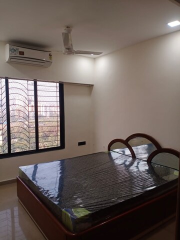 Bedroom in 2 BHK Apartment at Palash Towers, Andheri West – for Rent