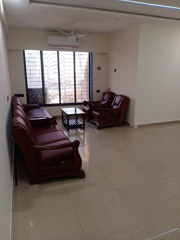 Living Room in 2 BHK Apartment at Palash Towers, Andheri West – for Rent