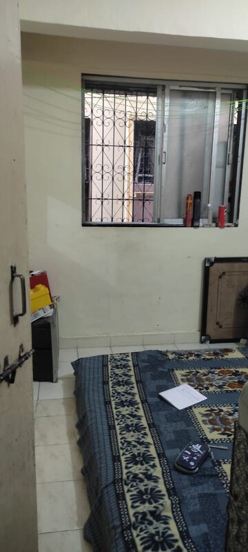 Living Room in 2 BHK Apartment at Nikita CHS, Ghansoli – for Sale
