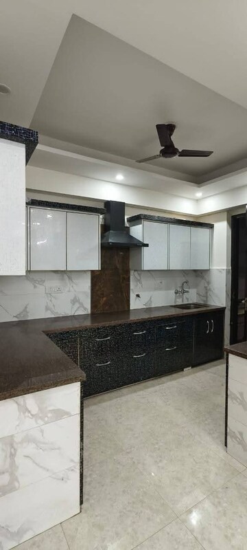 Kitchen in 3 BHK Apartment at Rohini Sector 9 – for Rent