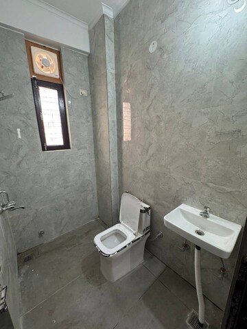 Bathroom in 3 BHK Apartment at Rohini Sector 9 – for Rent
