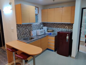Team Area in 1 RK Apartment at Supertech Czar Suites, Omicron I Greater Noida – for Rent