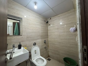 Bathroom in 1 BHK Apartment at Sunteck West World, Naigaon East – for Rent