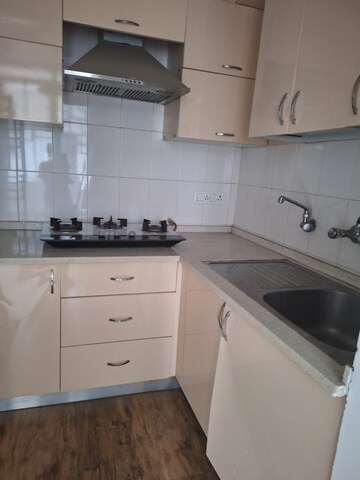 Kitchen in 2 BHK Apartment at Ambience Creacions, Sector 22 – for Rent